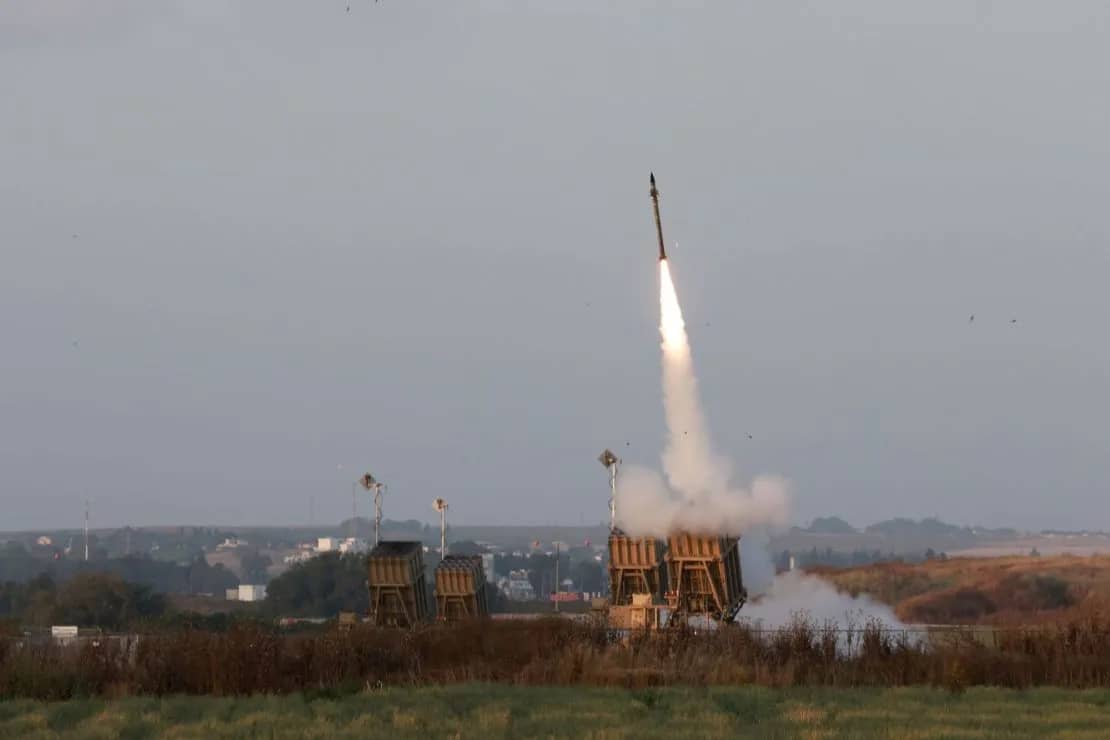 Israel's Defense System: Iron Dome intercepting incoming missiles near Israel's eastern border.