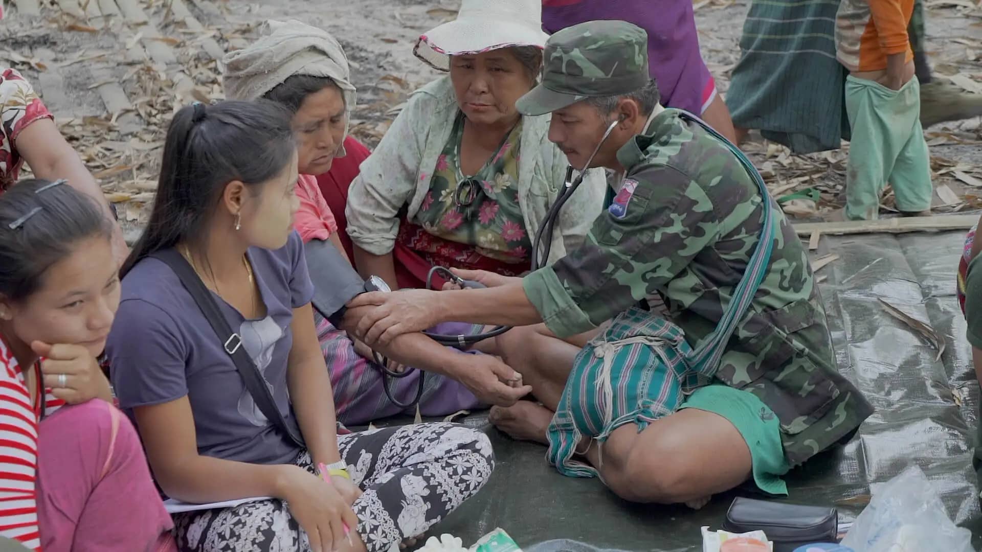 A group of diverse pro-democracy protesters united against the backdrop of Myanmar's political crisis.