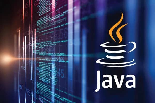 Developer coding in Java on a laptop