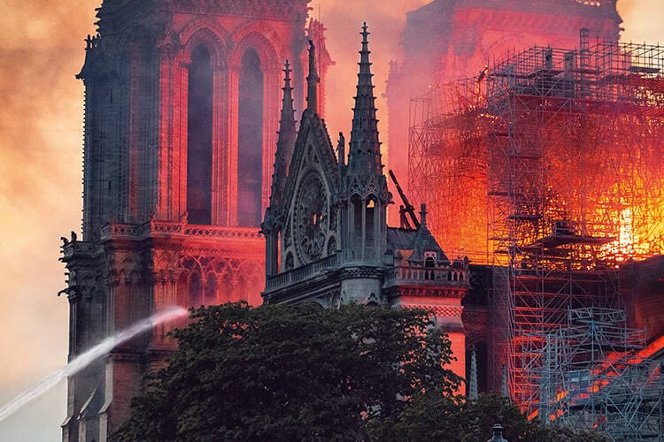 The iconic facade of Notre-Dame Cathedral in Paris, France.