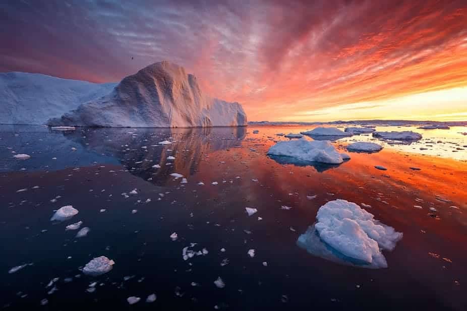 Northern Lights dancing over the icy landscape of Disko Bay